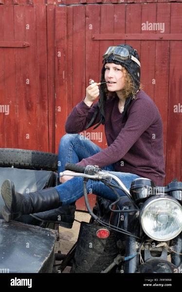 photo-of-girl-on-vintage-motorbike-in-pilot-cap-with-smoking-pipe-2BB9888.jpg